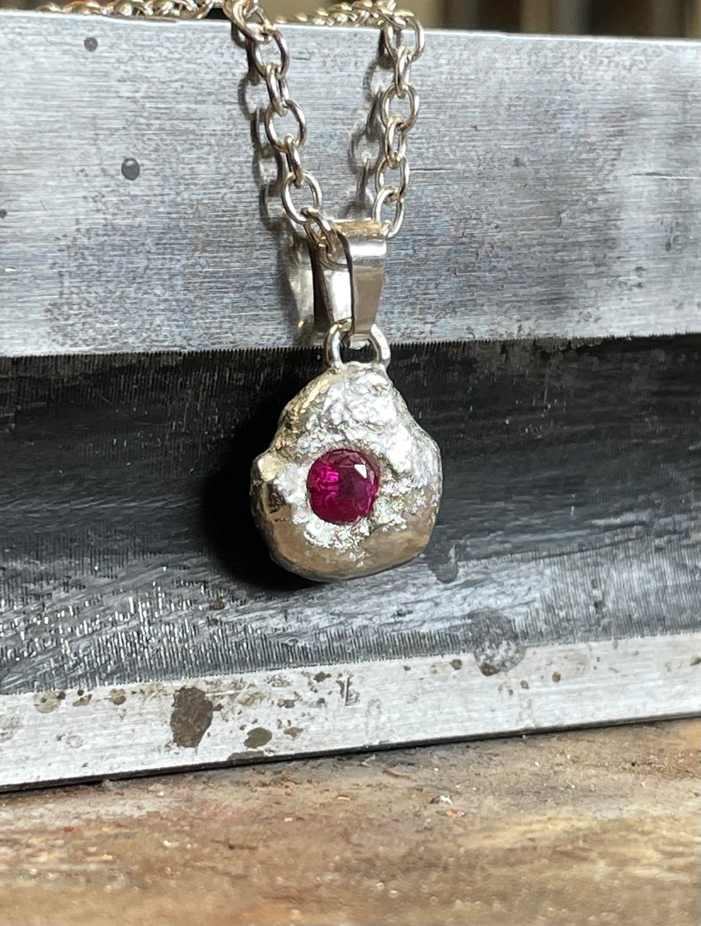 Pendant with a Red Zirconia